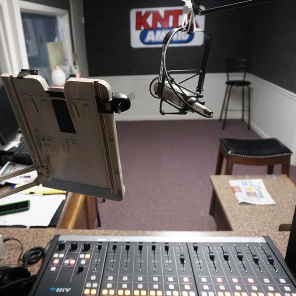 Board and controls in the DJ Booth at KNTX radio